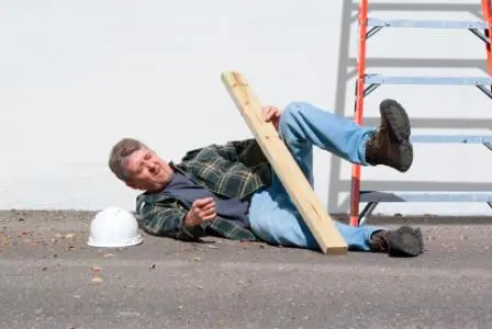 injured construction worker fallen off of a ladder on the job site